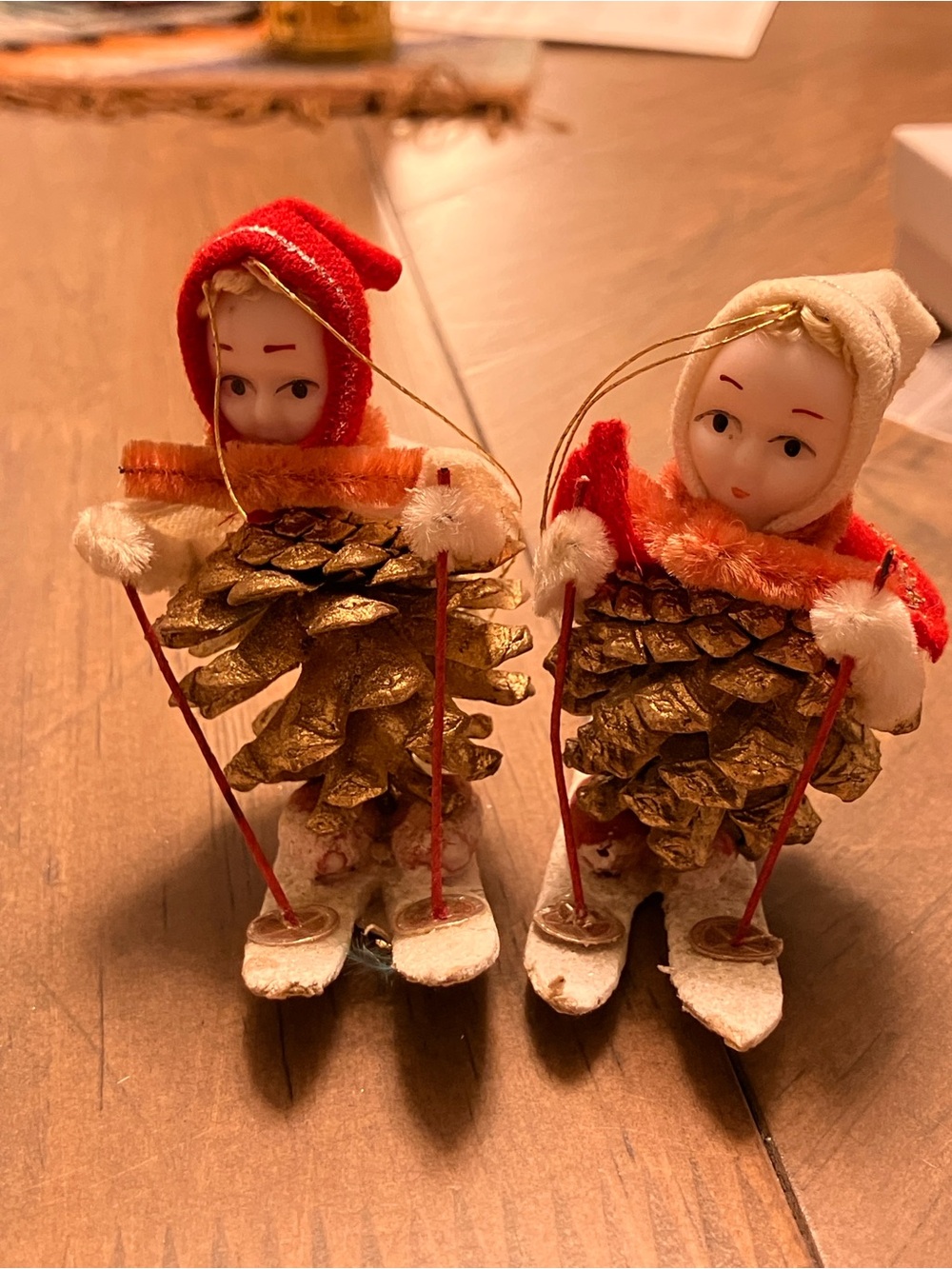 Two Pine Cone Skier Ornaments